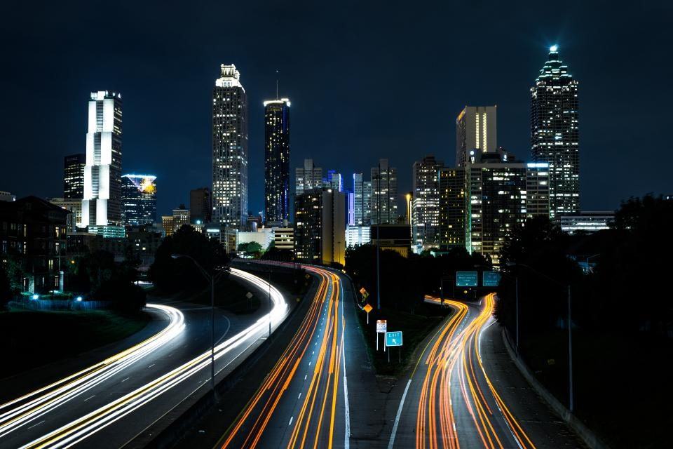 Los Angeles skyline and freeway light trails at night, where Black Diamond Law represents catastrophic injury clients